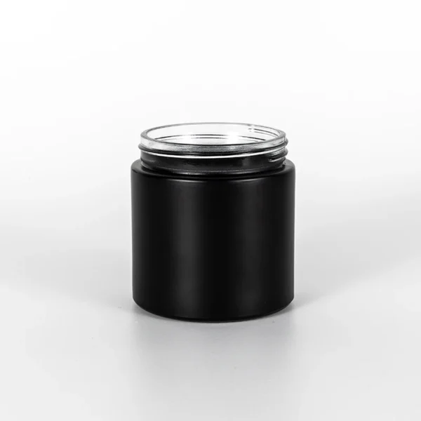 8oz straight-sided matte black glass jar with child-safe lid.