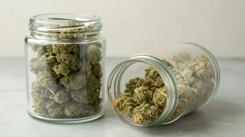 Various Cannabis Glass Jar Sizes stacked together to show capacity and storage options.